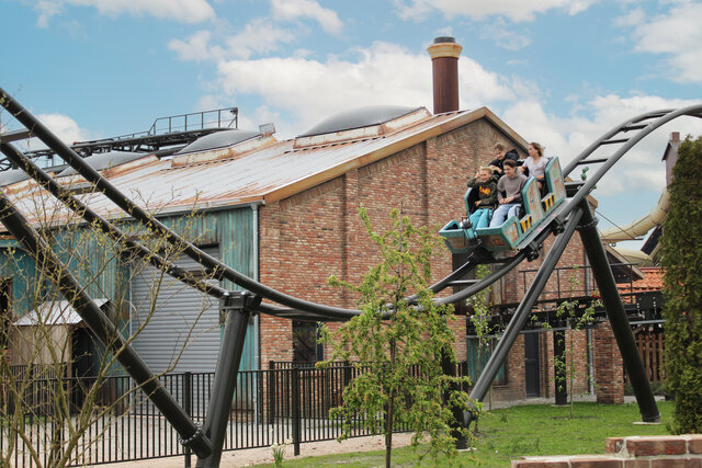 New Bobsled Coaster rushing over factory site
